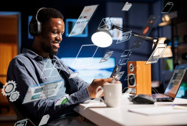 Business person using laptop multitasking to finish daily startup tasks, internet of things concept. Uses artificial intelligence optimization system for productivity, access pc smart things menu.