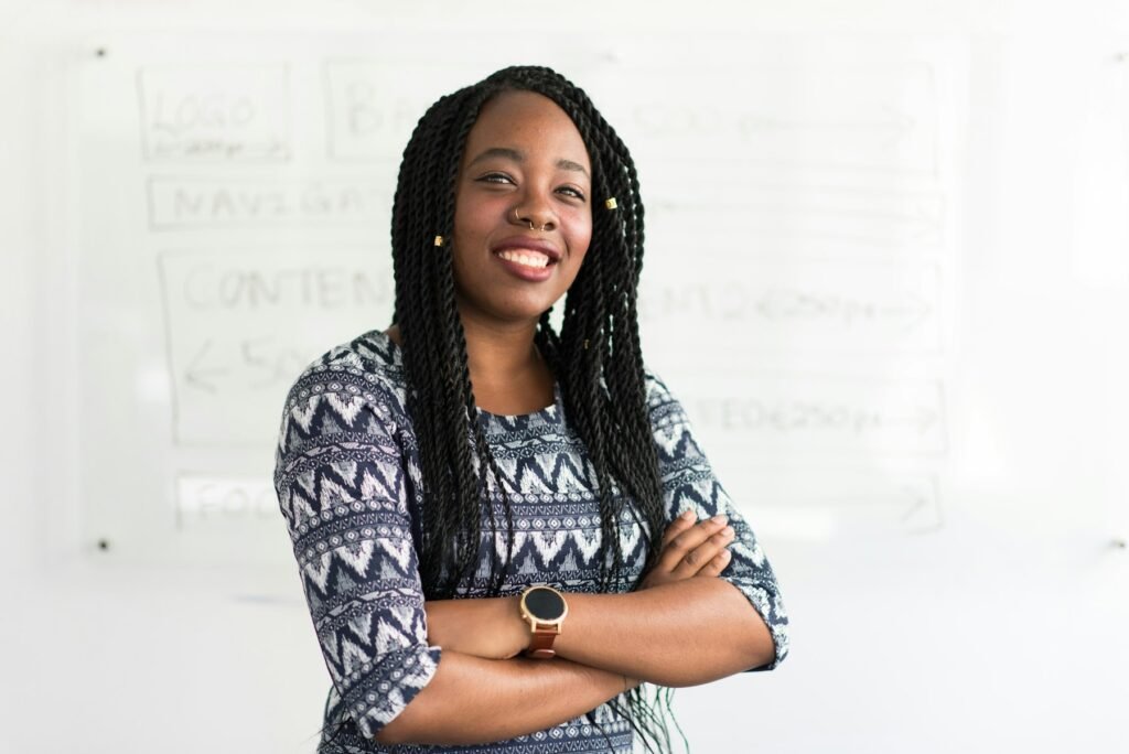 A confident facilitator standing in front of a whiteboard